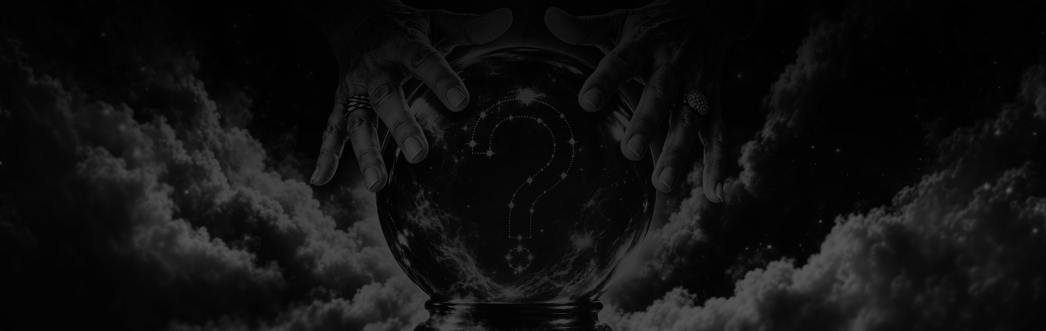Mãos sobre uma bola de cristal com uma interrogação de estrelas